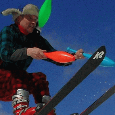 Tommy Tropic juggles colorful plastic bowling pins while hitting a ski jump at Treetops Resort.