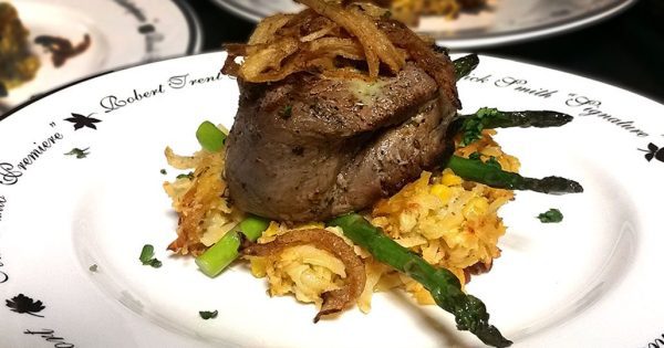 Fancy dinner plates with beef tenderloin, asparagus and potato